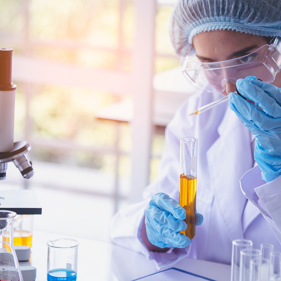 woman using chemistry equipment