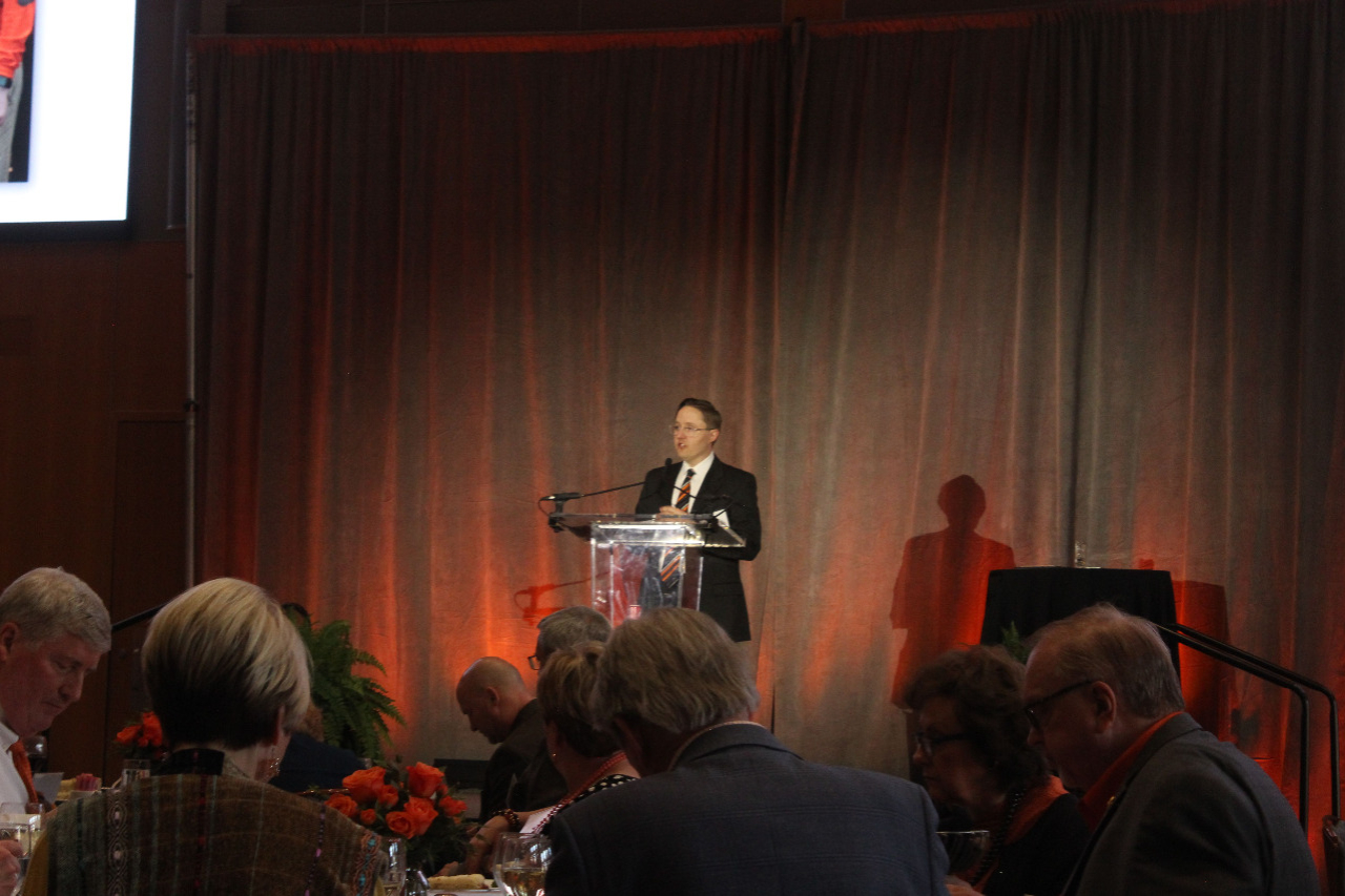 Mr. John Fields at podium giving a speech. Mr. John Fields at podium giving a speech.