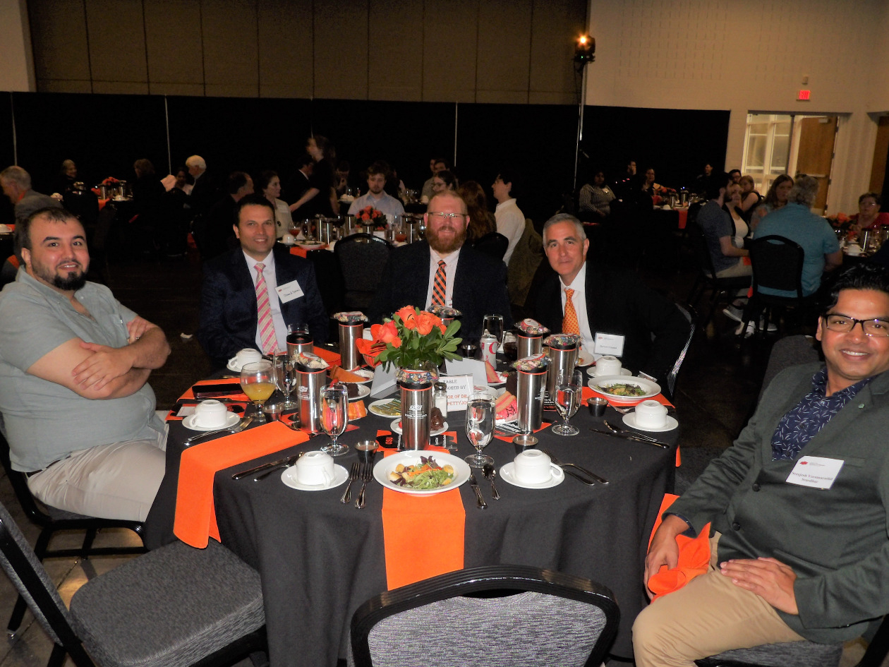 Mr. Khalid, Dr. Ahmed Ismail, Dr. Brandon Spencer, Mr. Barret and Mr. Sreejesh sitting together at the banquet dinner. Mr. Khalid, Dr. Ahmed Ismail, Dr. Brandon Spencer, Mr. Barret and Mr. Sreejesh sitting together at the banquet dinner.