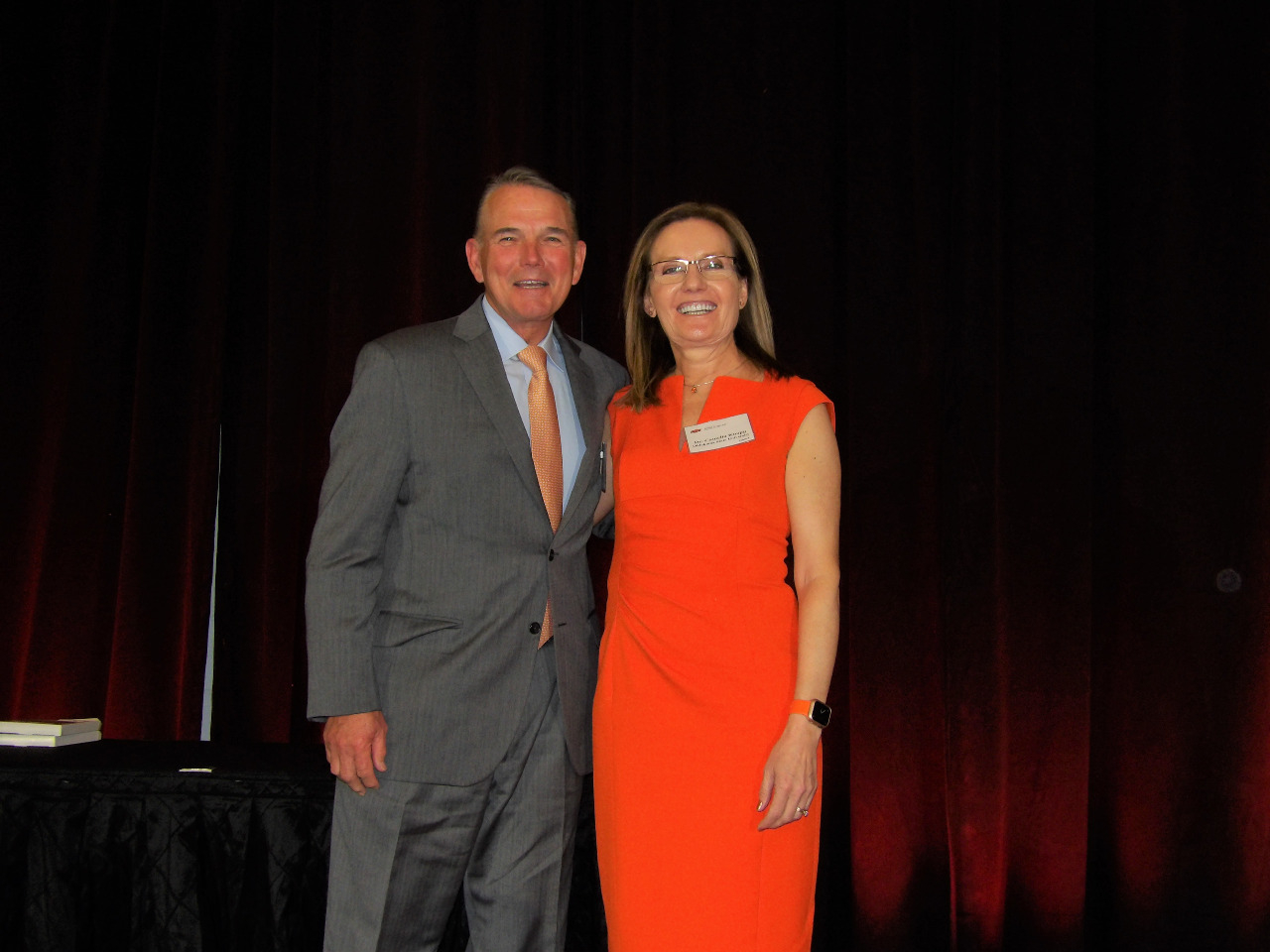 Mike Gaskins and Camelia Knapp posing together at banquet. Mike Gaskins and Camelia Knapp posing together at banquet.
