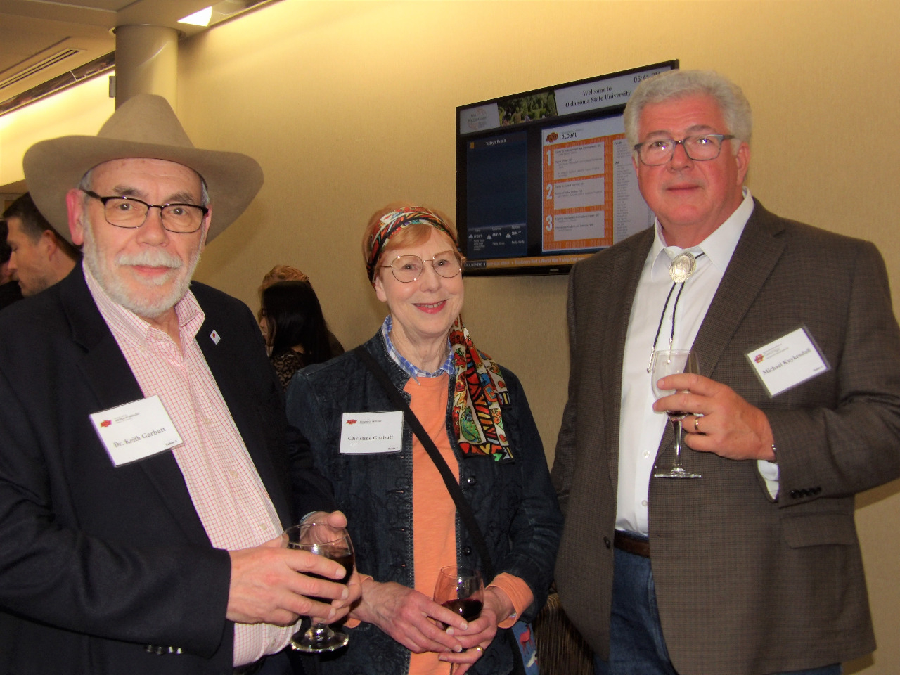 Dr. Keith Garbutt,Mrs. Christine Garbutt and Mr. Michael Kukendall visiting together before banquet begins. Dr. Keith Garbutt,Mrs. Christine Garbutt and Mr. Michael Kukendall visiting together before banquet begins.