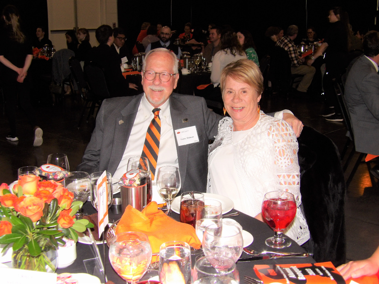 Mr. Lanny and Mrs. Cathy Holman enjoying dinner together at the banquet. Mr. Lanny and Mrs. Cathy Holman enjoying dinner together at the banquet.