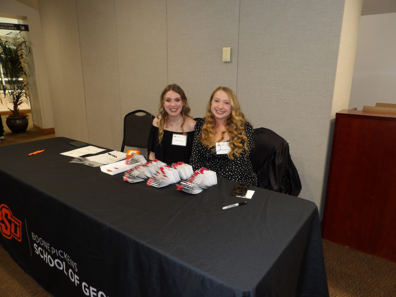 Ms. Megan Garrett and Ms. Izabelle Buentello checking people in at banquet. Ms. Megan Garrett and Ms. Izabelle Buentello checking people in at banquet.