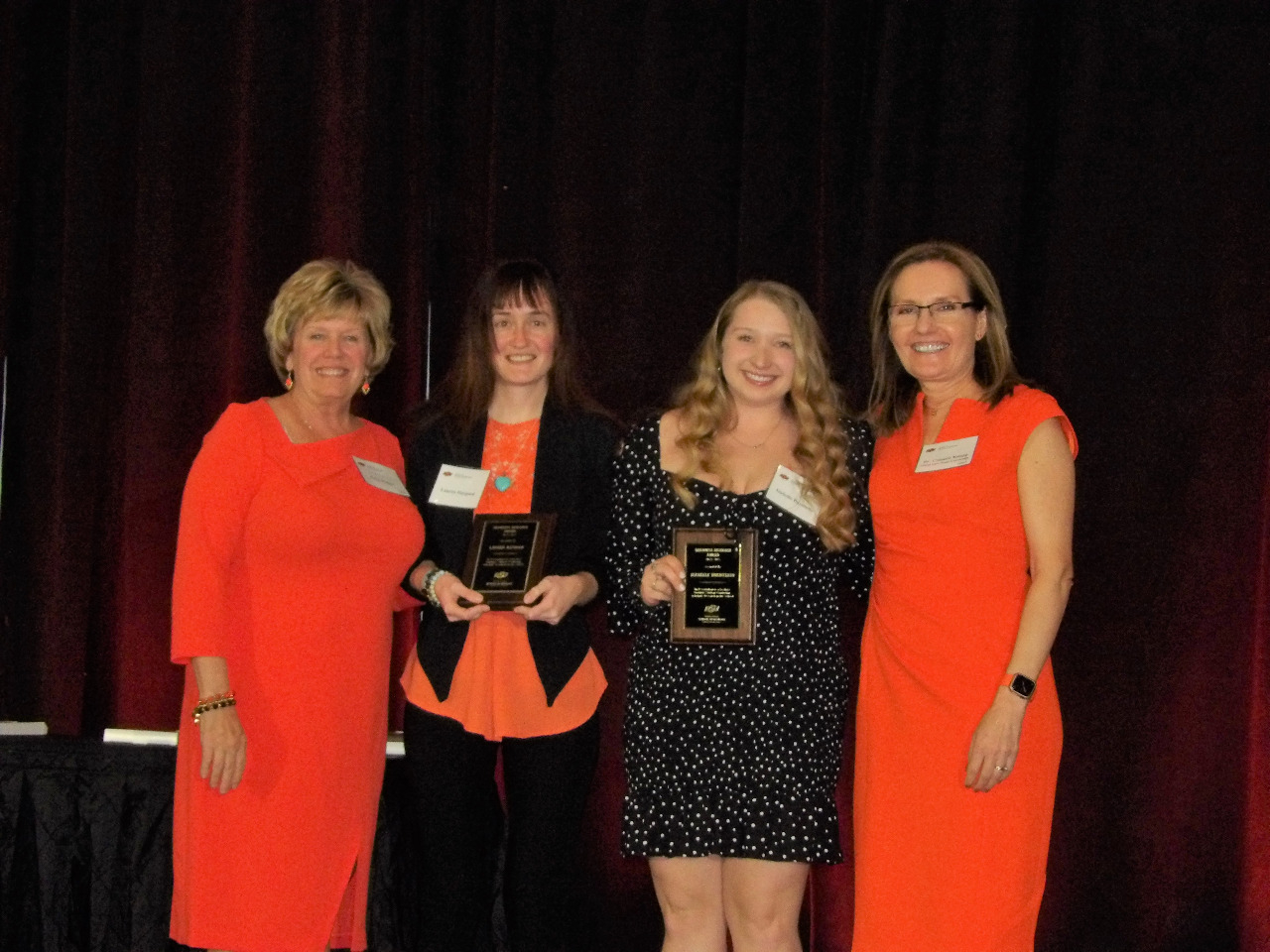 Mrs. Patty Walker and Dr. Camelia Knapp giving awards to both Ms. Lauren Haygood and Ms. Izabelle Buentello. Mrs. Patty Walker and Dr. Camelia Knapp giving awards to both Ms. Lauren Haygood and Ms. Izabelle Buentello.