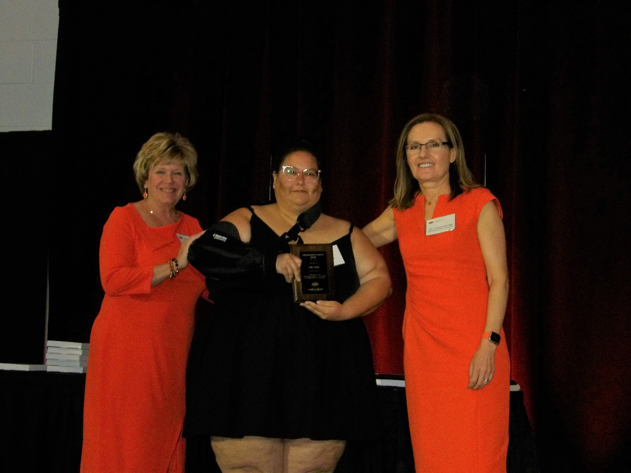 Mrs. Patty Walker and Dr. Camelia Knapp presenting award to Ms. Lori Huck. Mrs. Patty Walker and Dr. Camelia Knapp presenting award to Ms. Lori Huck.