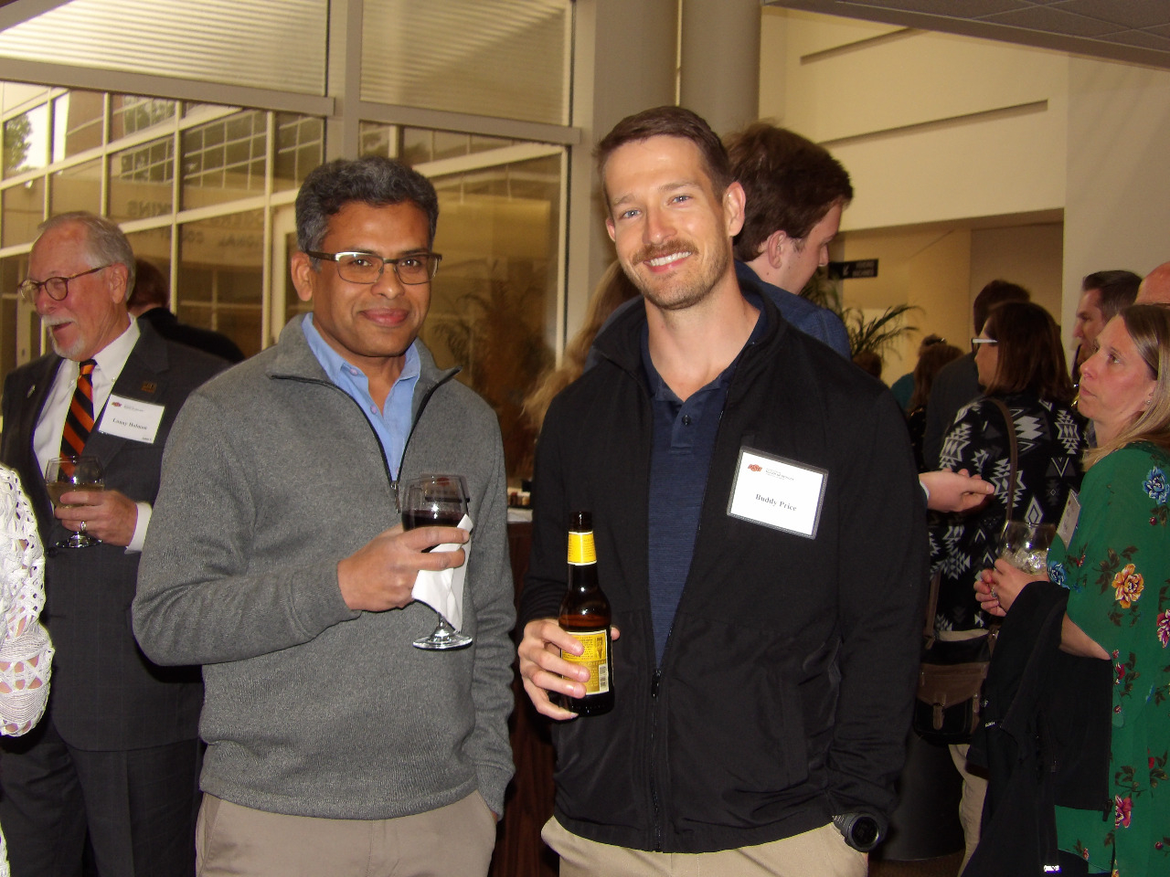 Dr. Pryiank Jaiswal and Mr. Buddy Price. visiting together before banquet begins. Dr. Pryiank Jaiswal and Mr. Buddy Price. visiting together before banquet begins.