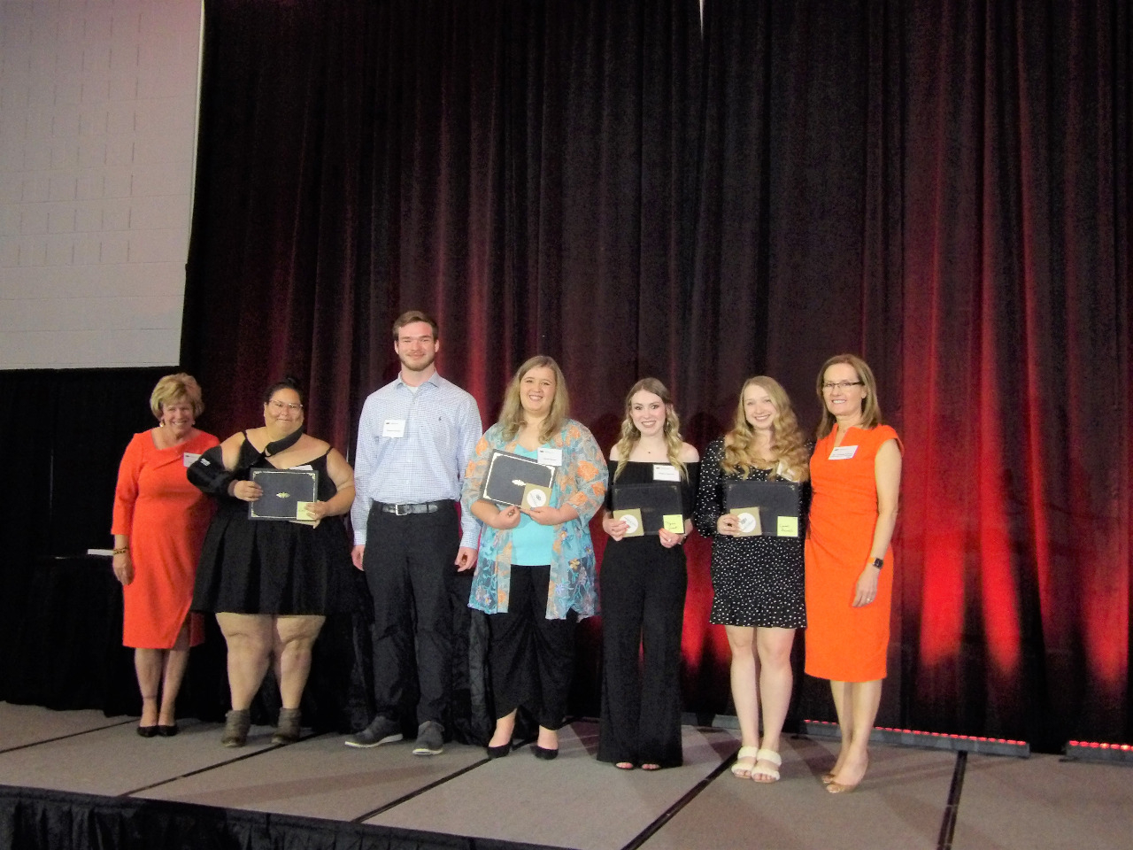 Four female and one male scholarship recipients with Mrs. Patty Walker and Dr. Camelia Knapp. Four female and one male scholarship recipients with Mrs. Patty Walker and Dr. Camelia Knapp.