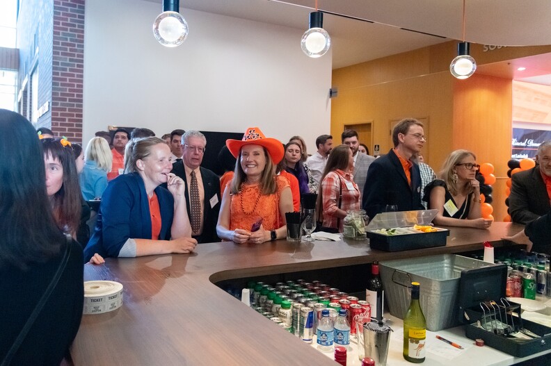 People waiting to try the specialty drink "Rock The Orange". People waiting to try the specialty drink "Rock The Orange".