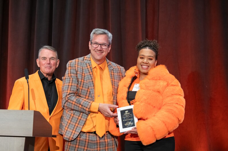 Mike Gaskins and Todd Halihan giving the Alumni Advisory Award to Kelsy Bufford on behalf of Estela Atekwana Mike Gaskins and Todd Halihan giving the Alumni Advisory Award to Kelsy Bufford on behalf of Estela Atekwana.