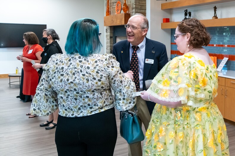 Jim Puckette, Elaine Duffy and her guest catching up in the silent auction room Jim Puckette, Elaine Duffy and her guest catching up in the silent auction room.