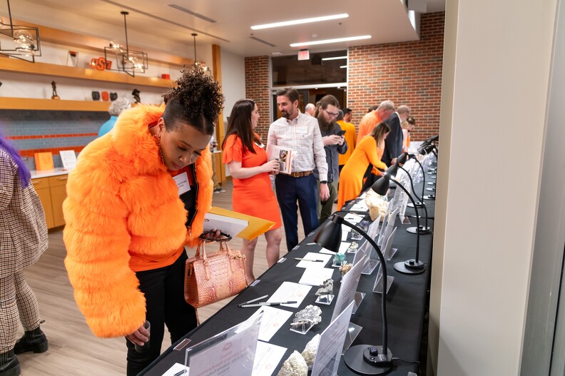 Kelsey Bufford and others checking out what all there is at the silent auction Kelsey Bufford and others checking out what all there is at the silent auction.