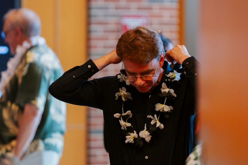 Dr. Daniel Lao Davila putting on his Lei. Dr. Daniel Lao Davila putting on his Lei.