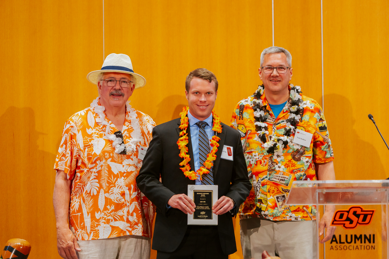 Mike Kuykendall and Todd Halihan giving Ian Cox his Graduate Research Award Mike Kuykendall and Todd Halihan giving Ian Cox his Graduate Research Award