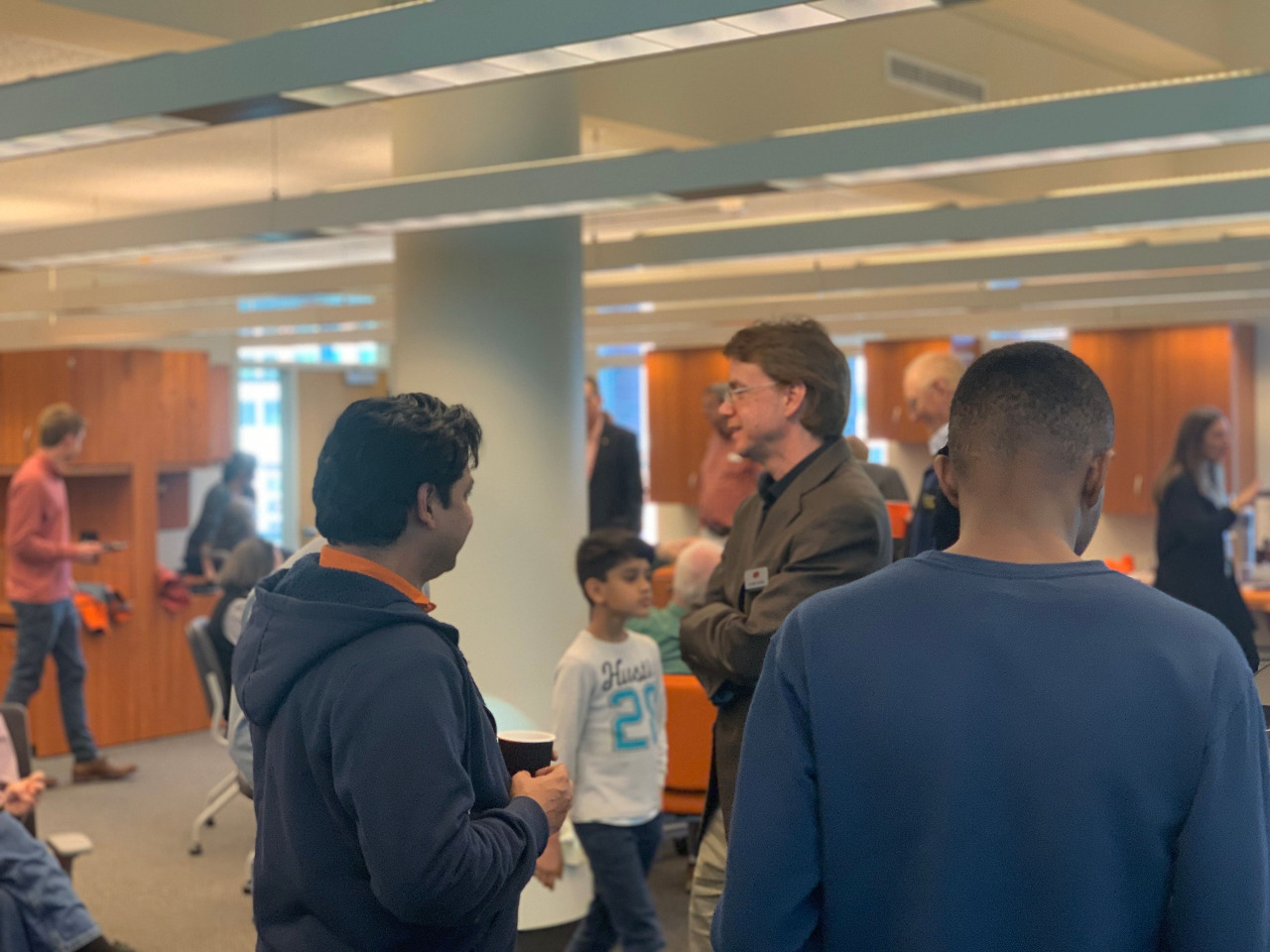 Faculty, Students and Family enjoying each other Faculty, Students and Family enjoying each other