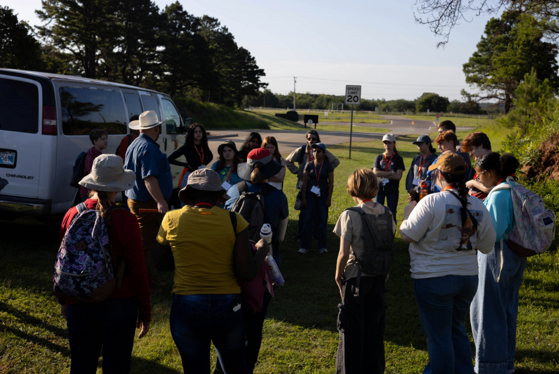 Dr. Brandon Spencer taking a group of GEO-Rex campers on a field trip. Dr. Brandon Spencer taking a group of GEO-Rex campers on a field trip.