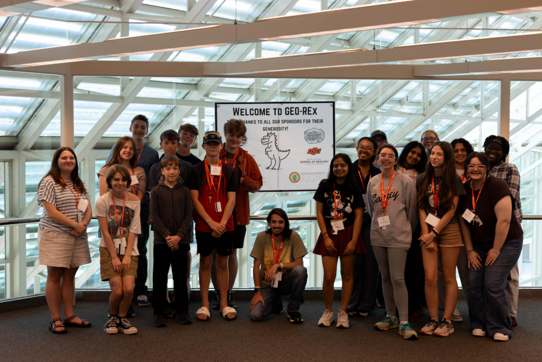 GEO-Rex campers taking a group picture with the donors poster as a thank you to the donors. GEO-Rex campers taking a group picture with the donors poster as a thank you to the donors.