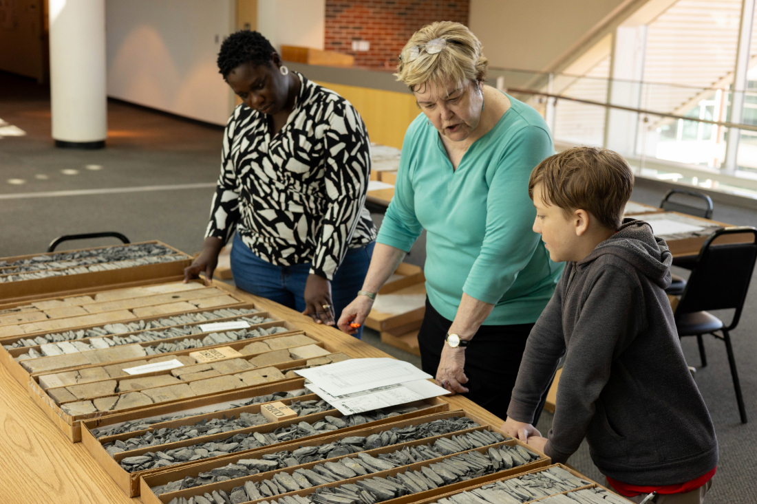 Dr. Mary Hileman and student Evelyn Nsarful explaining core samples to a GEO-Rex camper. Dr. Mary Hileman and student Evelyn Nsarful explaining core samples to a GEO-Rex camper.