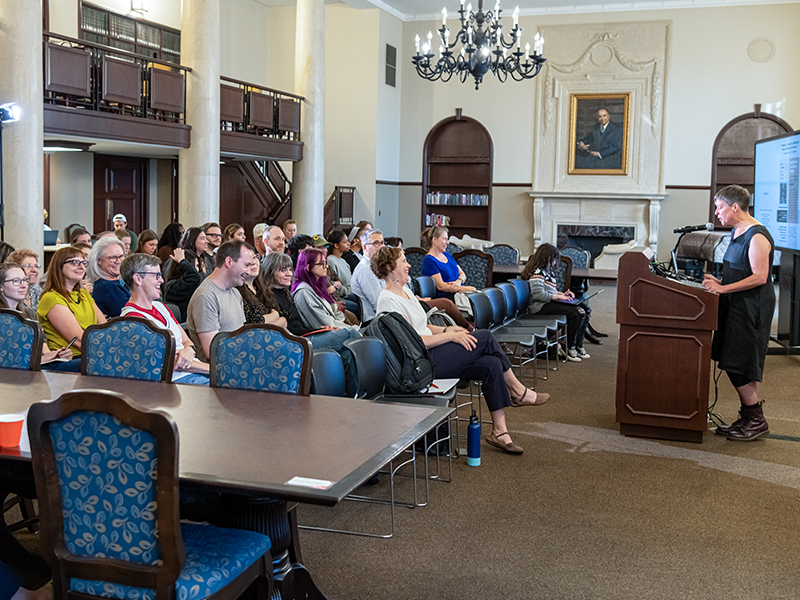 Wideshot from the side of Louise Siddons presenting