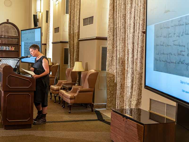 Louise Siddons presenting from the side