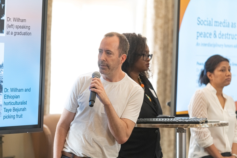 Dr. Greg Uhlin presenting