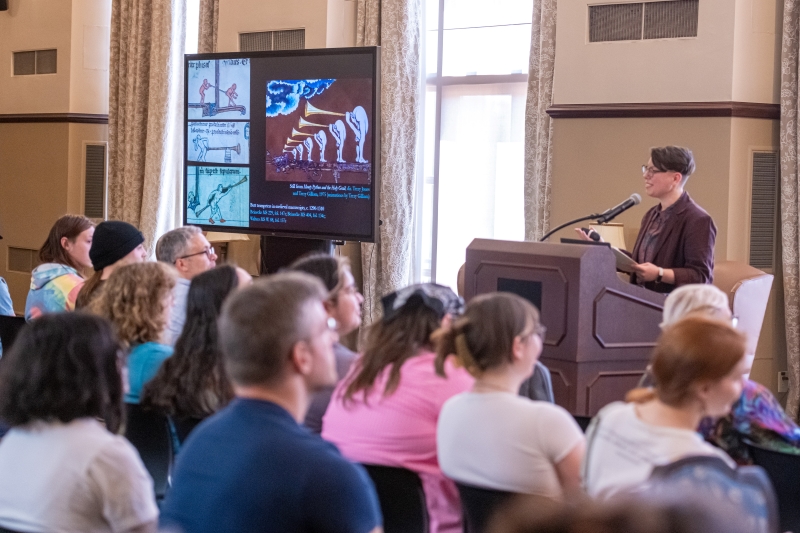 image is of Doyle presenting to the audience