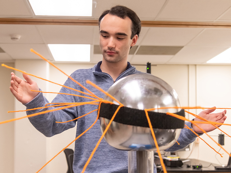 Student with an experiment