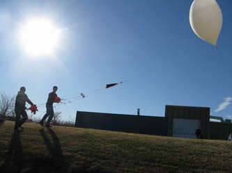 2 students doing weather balloon research