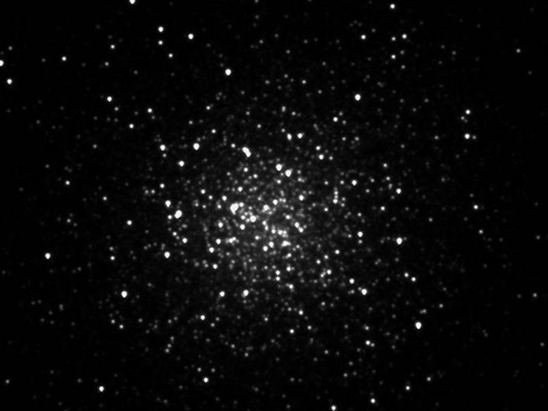 The Messier 13 globular star cluster imaged with a luminance (white light) filter.