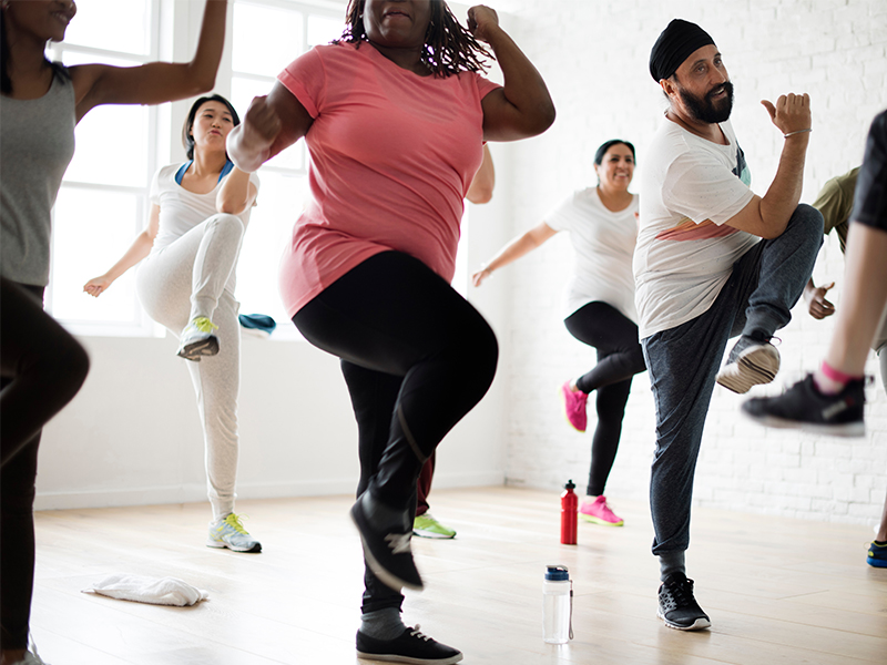 large group of people exercising