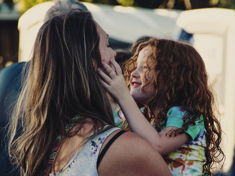 Mother and child being affectionate