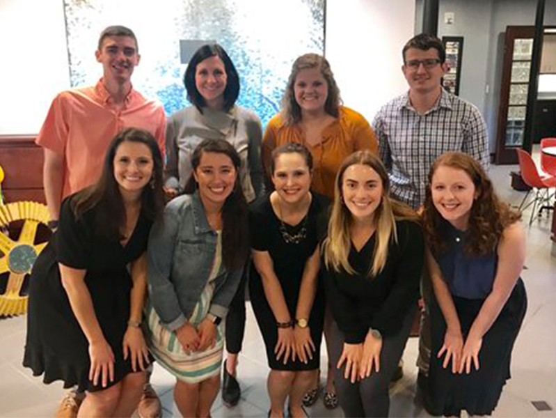 Group of students smiling at camera