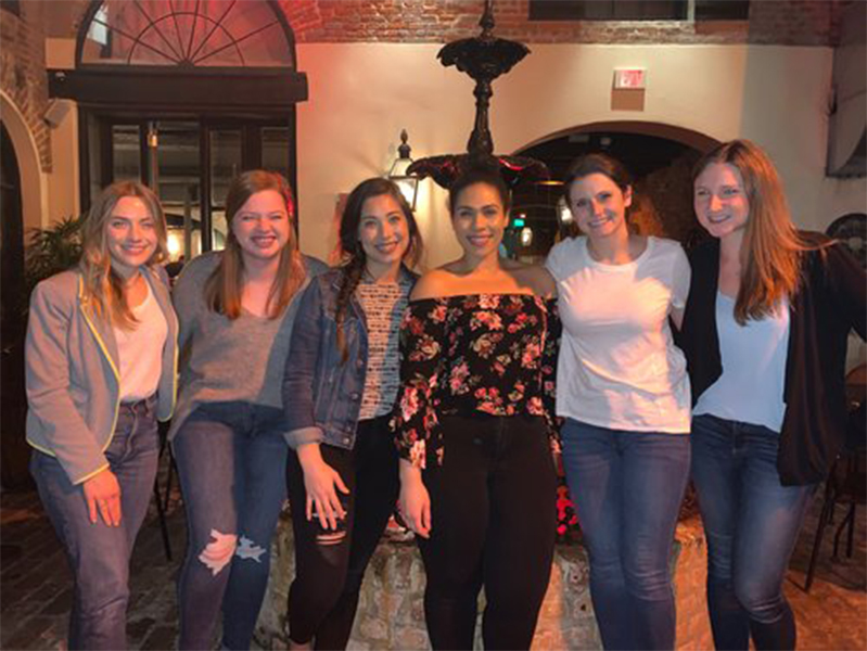 Group of female students smiling of the camera at the Society of Pediatric Psychology Annual Conference