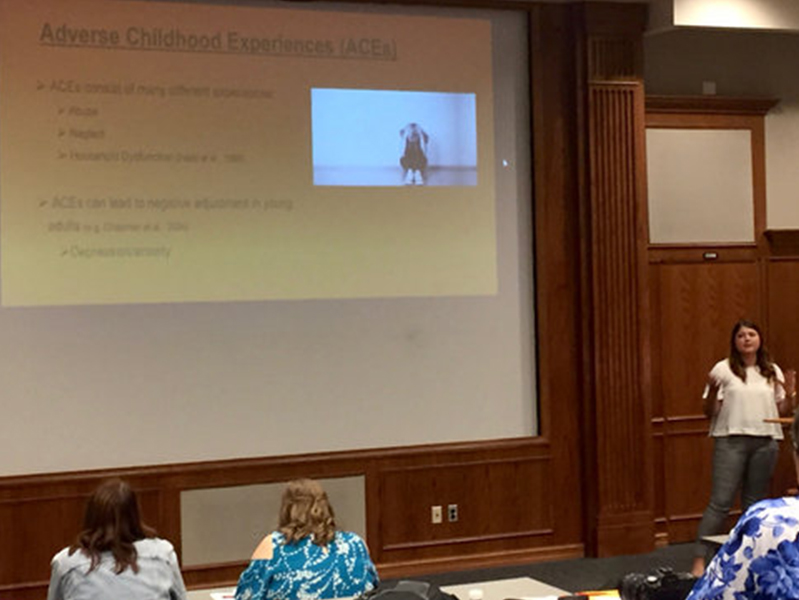 female student giving presentation