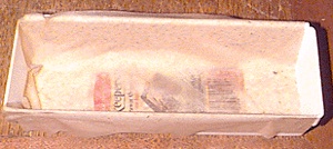 Tray with wet paper towel inside.