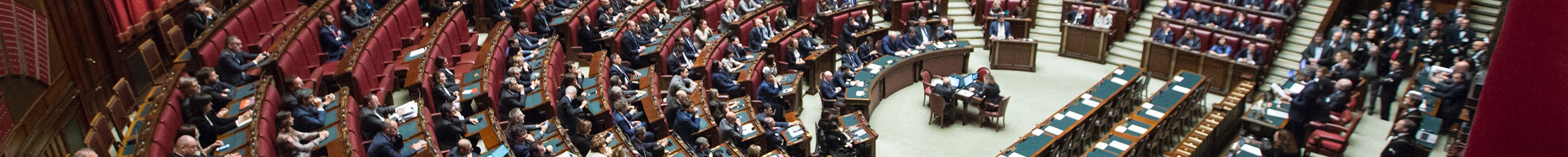 Socrates taking poison while people around him look sad.”